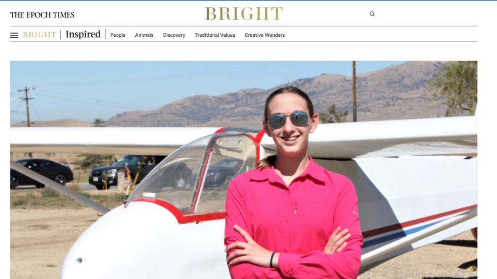 iLEAD Exploration learner stands in front of glider